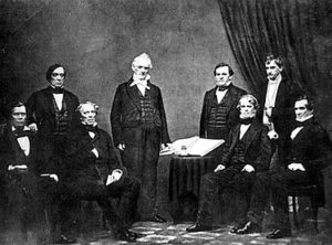 Buchanan and His Team of Confederates: (l-r) Jacob Thompson, Lewis Cass, John B. Floyd, President Buchanan, Howell Cobb, Isaac Toucey, Aaron V. Brown, and Jeremiah S. Black. Courtesy of the Library of Congress.